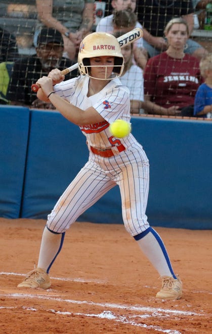 Bartow's Kynley Quartermaine (5) is hit by a pitch with the bases loaded, forcing in a run.