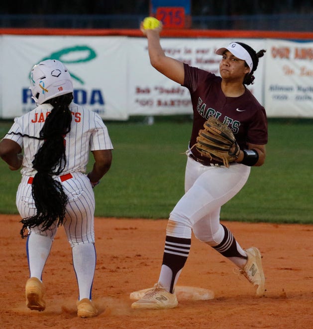 Eagles second baseman Kamryn Wallisa attempts a double play after forcing out Bartow's Niamah Johnson (9) at second.