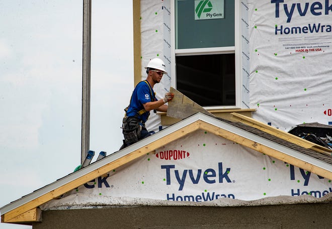 Construction crews work on 2 homes for the Extreme Makeover Home Edition program on Slippery Rock Street in Auburndale Fl. Wednesday August 7 2024.