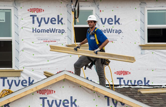 Construction crews work on 2 homes for the Extreme Home Makeover in Auburndale Fl. Wednesday August 7 2024.